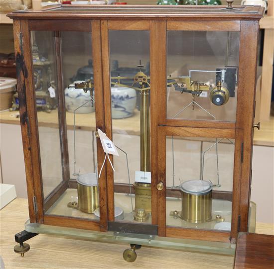 A cased set of medical scales height 56cm